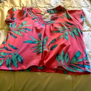 This is a  xl petite never worn  Caribbean joe blouse